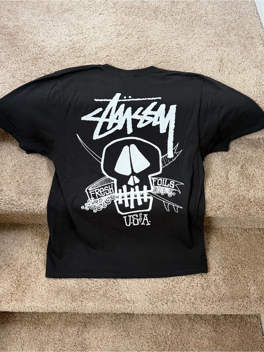 Stussy Black Tee with White Skull Back Graphic